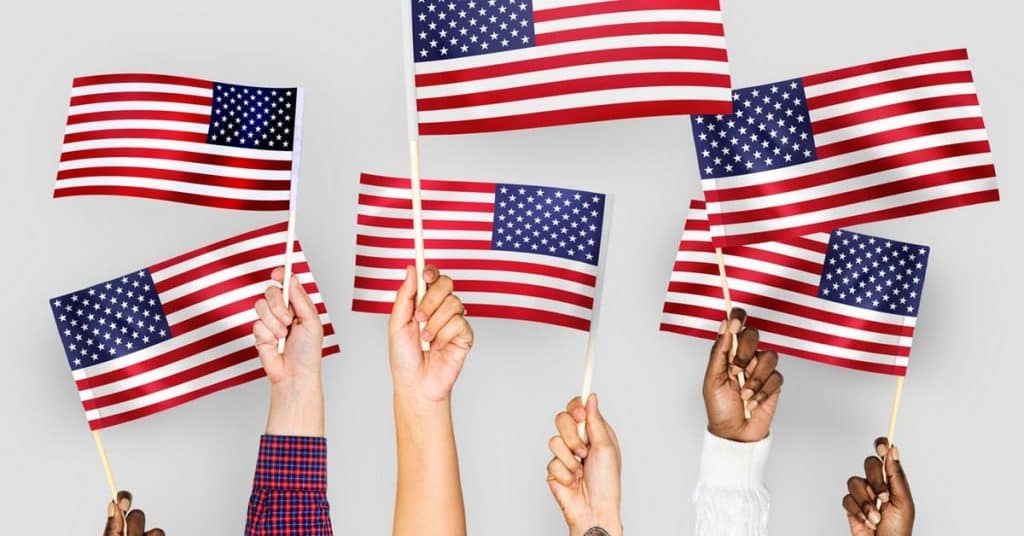immigrants waving flags